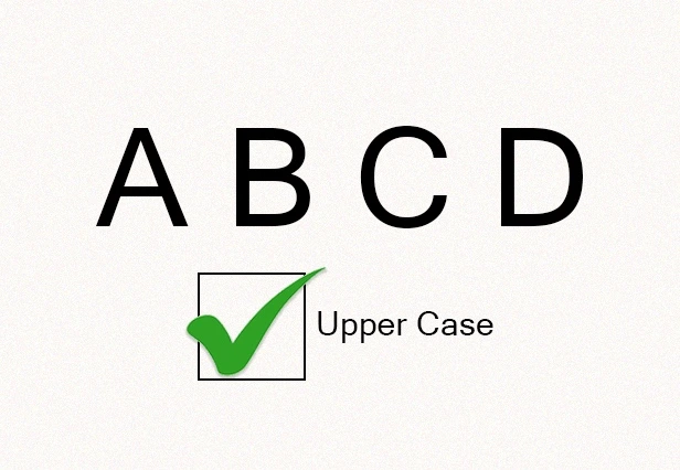 Example of uppercase letters used for ADA-compliant tactile signage with a check mark indicating correct format