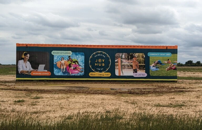 Shipping container wrap with vibrant custom vinyl graphics Shipping container wrap with vibrant custom vinyl graphics